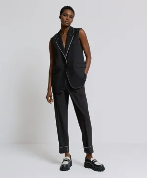 Pants with Turn- Up Hemlines and Piping Details